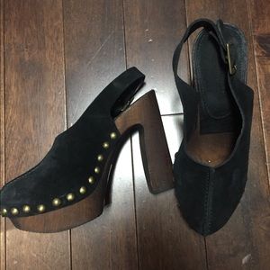 Black suede clogs with wood platform
